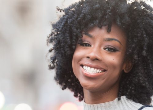 Close-up on a smiling woman's face after Botox treatments