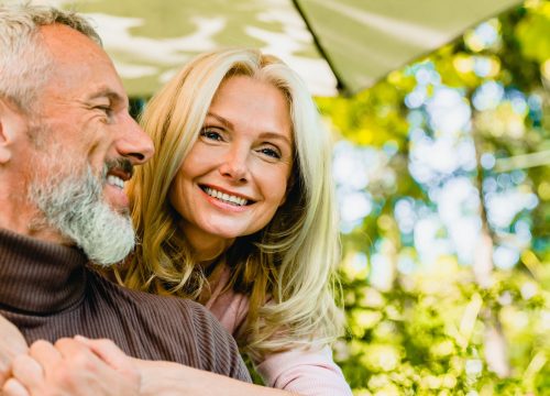 Happy middle-couple outside